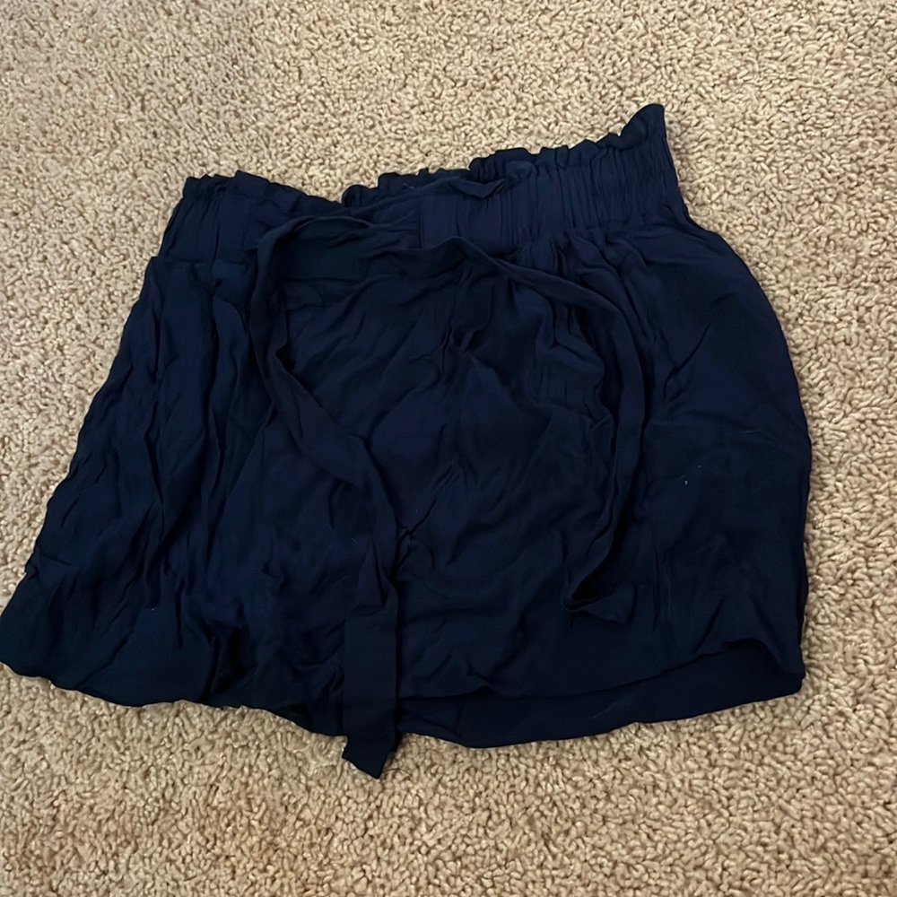 Blue flowy shorts. Light wear